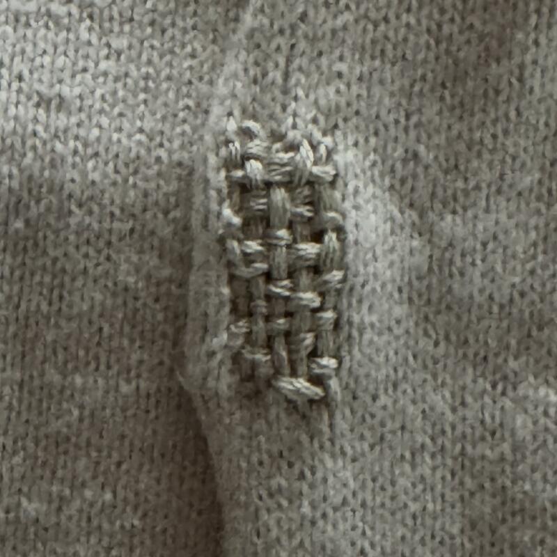 Darning on sweater